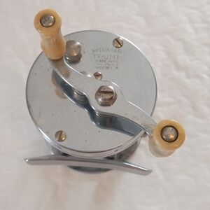Trump Silver and Tan Fishing Reel